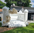 White jumping castle with garland